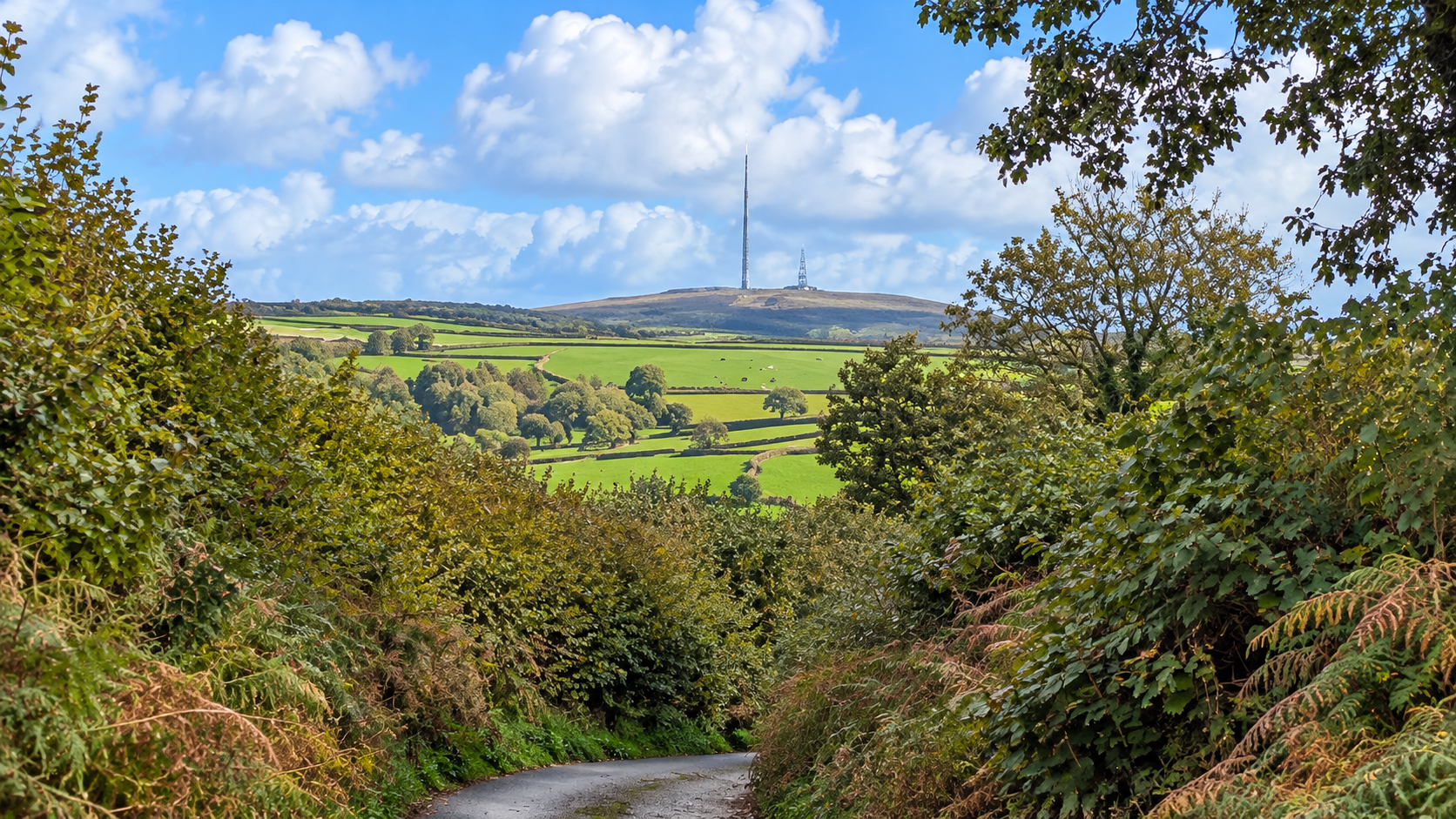 Carradon Hill, with its two conspicuous transmission masts.