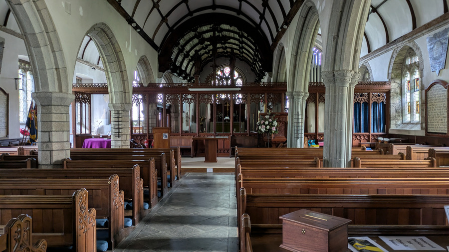 Looking along the aisle inside St Cleer parish church.