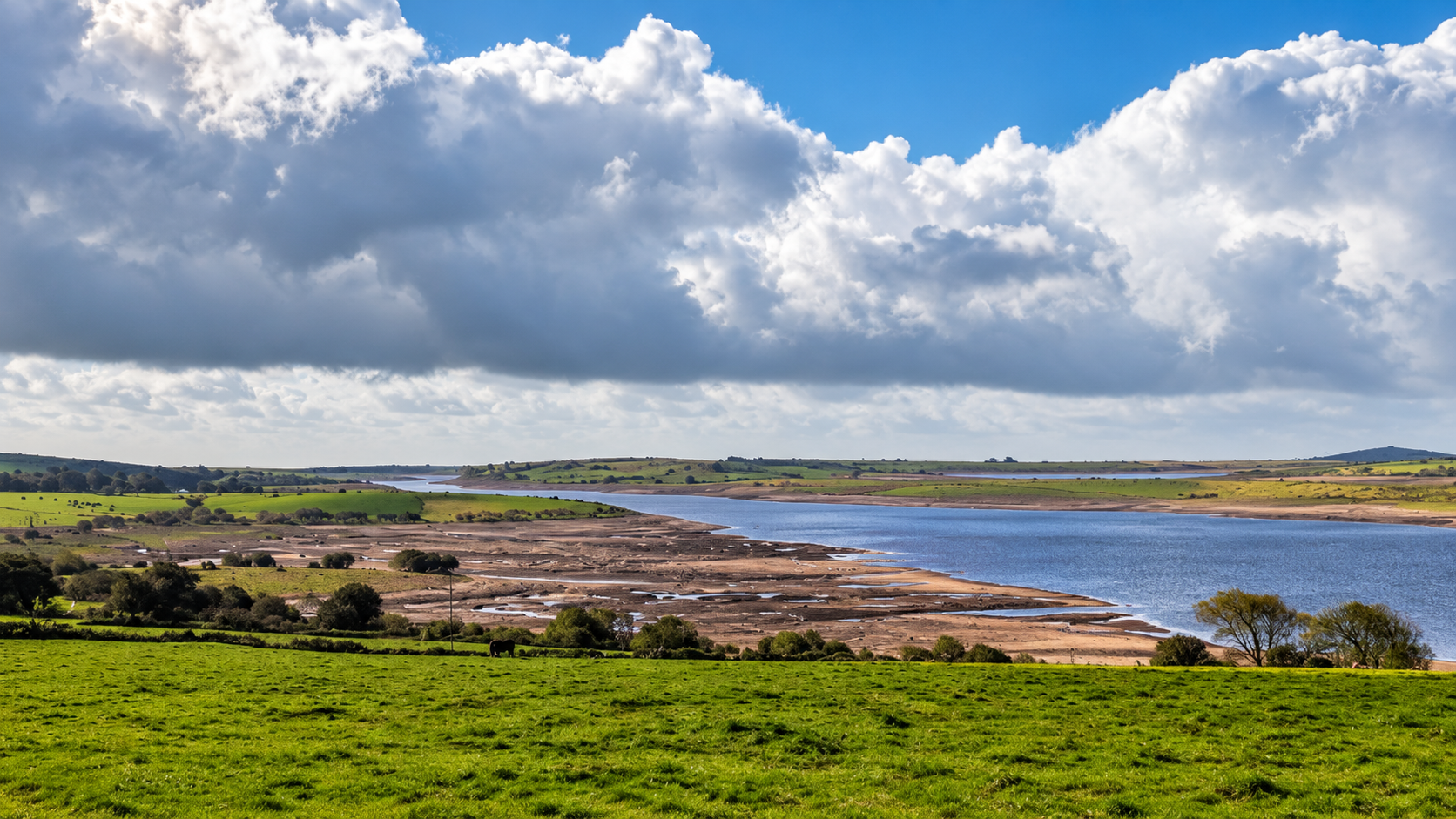 Colliford Lake, with extensive exposed banks after the summer drought.