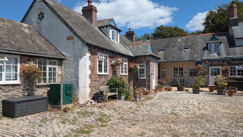 The courtyard of the converted estate buildings.